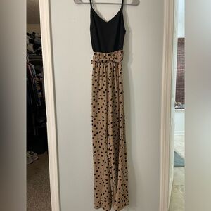 Blue Rain patterned jumpsuit. Black on top with leopard bottom